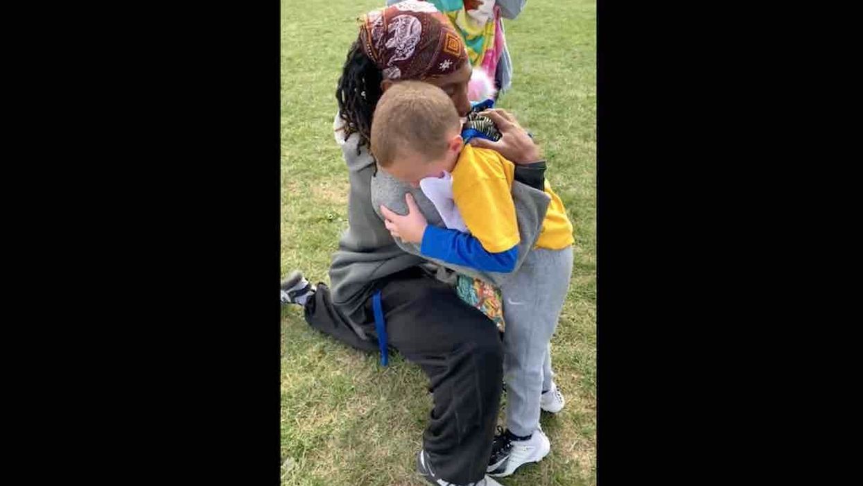 'Get your tissues ready': Little boy can't hold back his tears as he reads thank-you note to his football coach