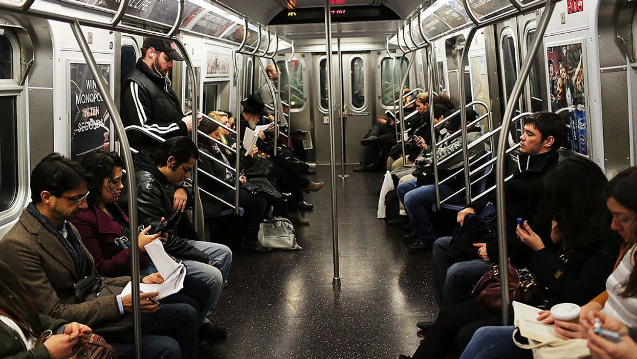 Video: Woman brutally attacks 79 year-old Christian man preaching on a NYC subway