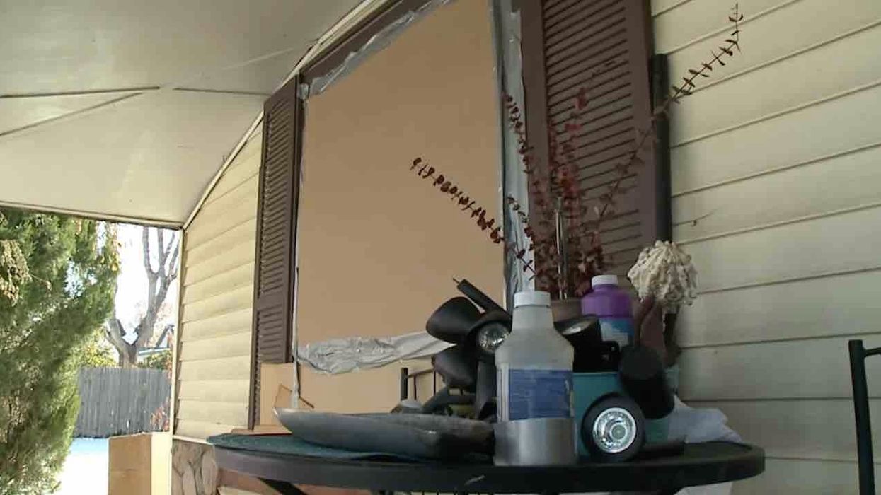 Cops: Homeowner shoots man who broke front window, tried to climb through it. Homeowner warned suspect he had gun, family says.