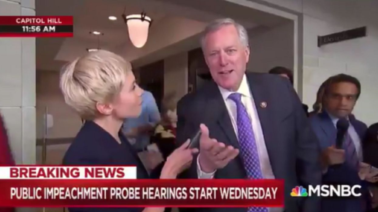 Watch: Mark Meadows walks past MSNBC reporter during live shot, returns to refute her spin