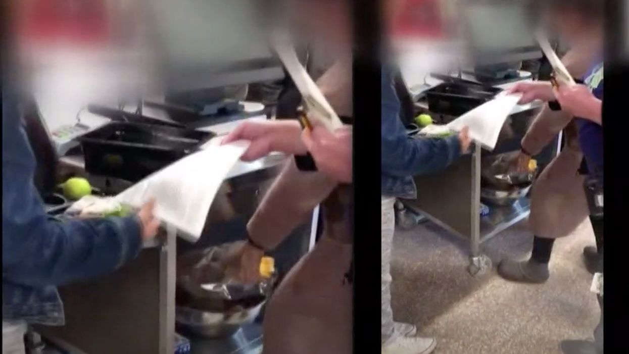 Viral video shows school food workers throwing out hot lunches of students with debts and replacing them with cold lunches. Now they're sorry.