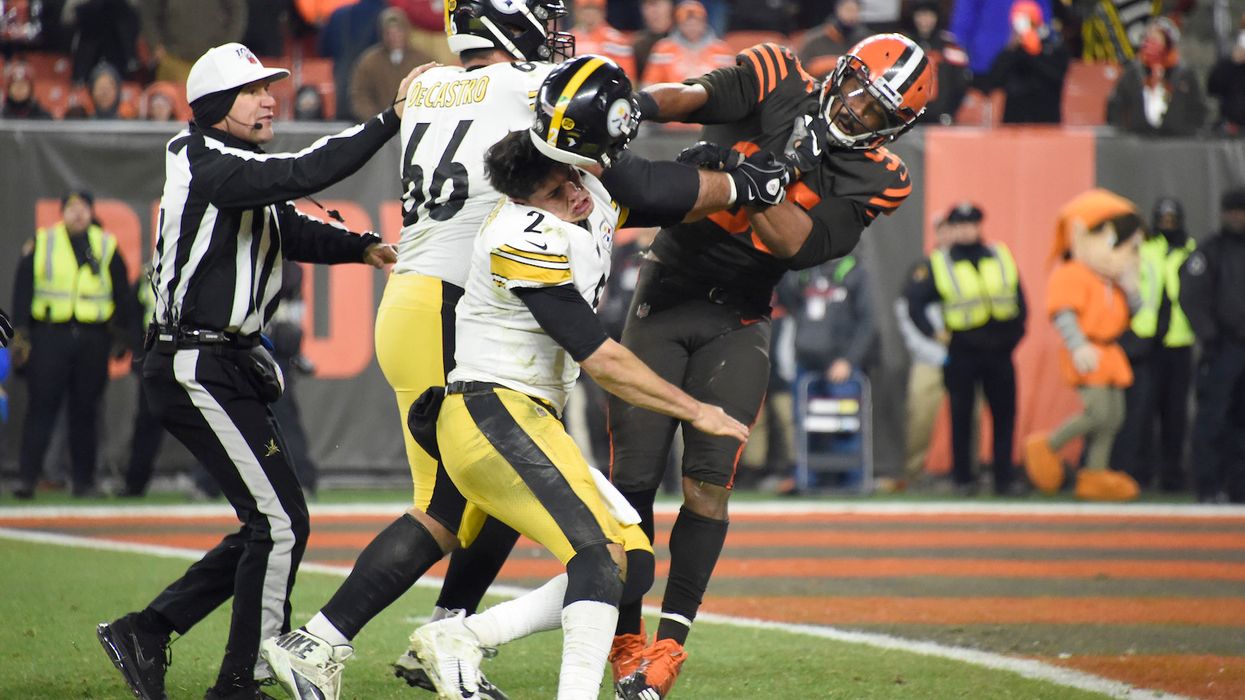 NFL player suspended indefinitely after ripping opposing QB's helmet off and beating him with it in wild brawl