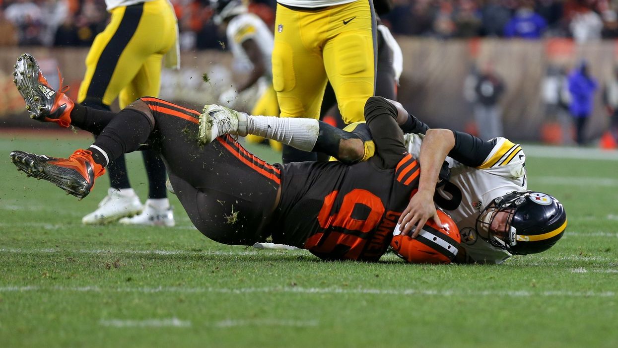 Calls mount for QB hit with his own helmet to be suspended for his role in ugly NFL brawl