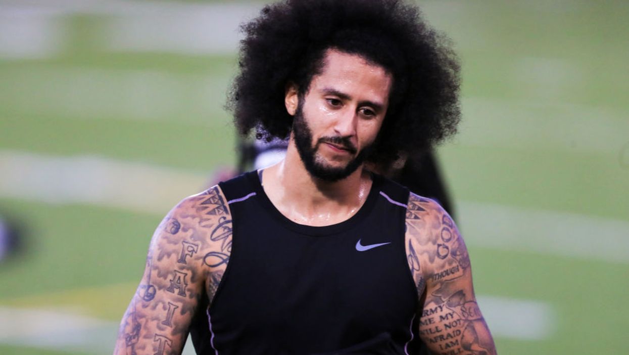 Rapper Jay-Z and the NFL rip Colin Kaepernick after he misses planned workout