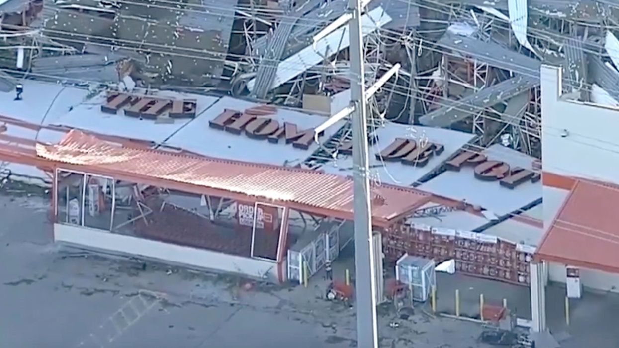 Dallas deputies hired to guard a tornado-damaged Home Depot were arrested for robbing the store themselves
