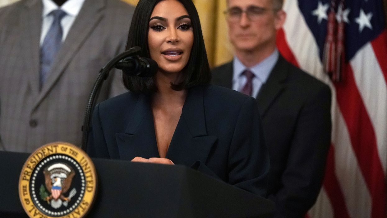 Kim Kardashian says husband Kanye West, a new Christian, and her experience at the White House prompted her to quit her overtly sexual look