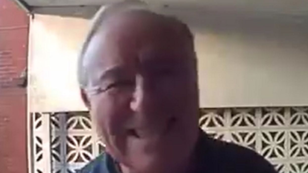 Cheery grandpa plays along with his son's practical joke