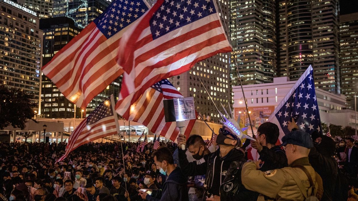 Thousands in Hong Kong take to the streets in 'Thanksgiving' rally praising US, President Trump