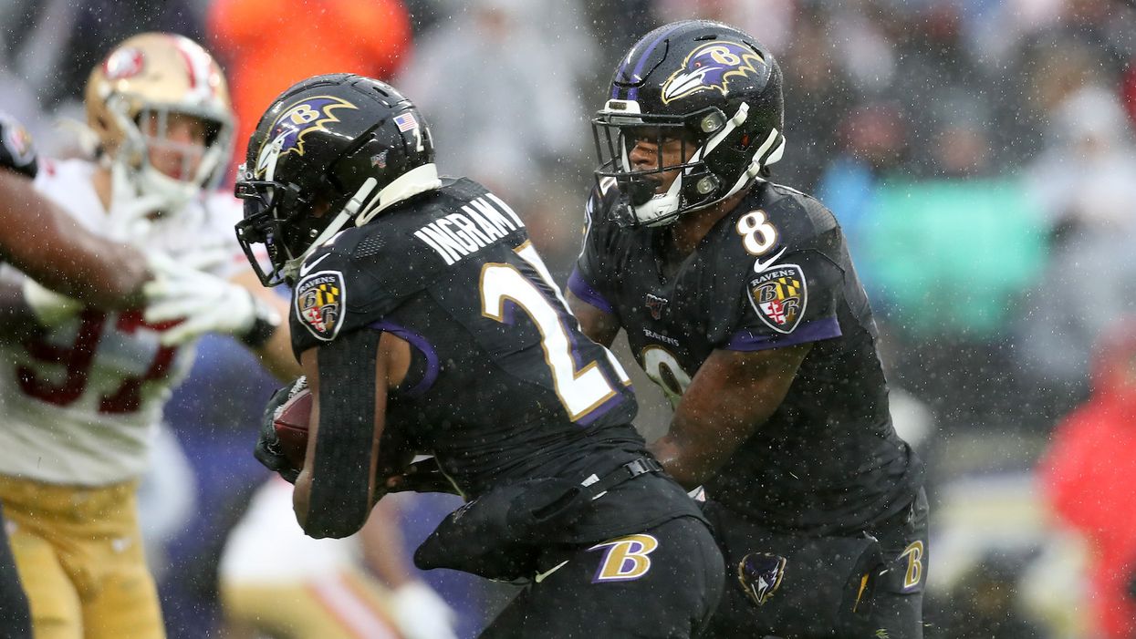 NFL radio analyst suspended for saying black QB's dark skin helps him hide the football on fake handoffs