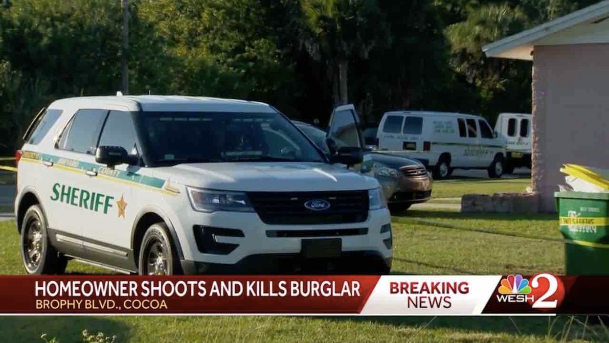 Masked intruder breaks window in back of home, tries to climb inside. But homeowner with gun permanently ends crook's escapade.