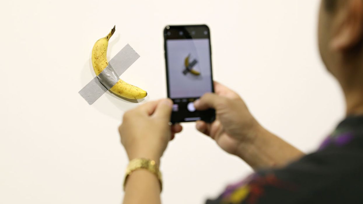Video: Man eats $120,000 banana 'art work' that was duct-taped to a wall