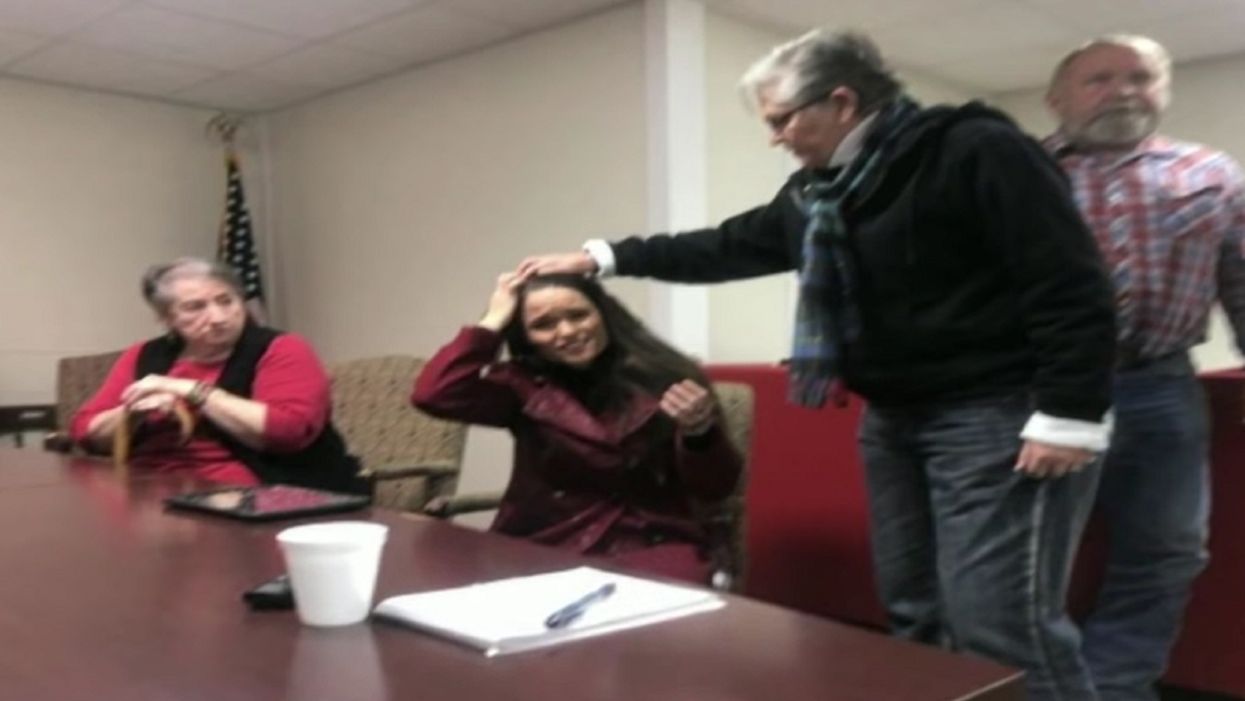 'Classless': Commissioner's wife arrested after dumping soda over a reporter's head