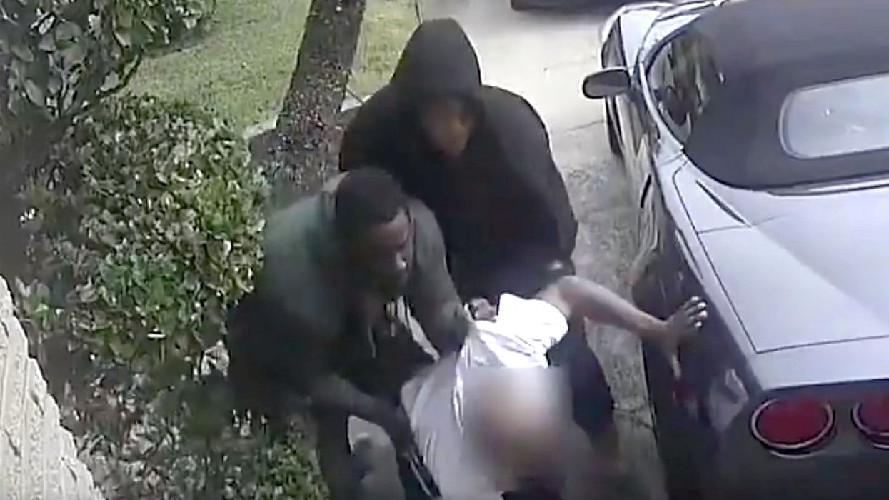 VIDEO: Three armed burglars target Houston homeowner for brazen robbery — but his wife has a gun too