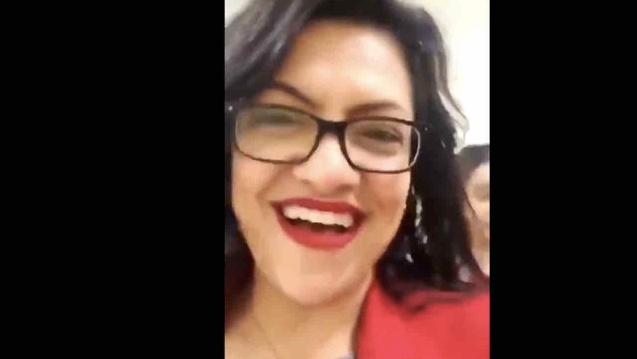 VIDEO: Far-left US Rep. Rashida Tlaib can't hide her happiness as she walks to House to vote for President Trump's impeachment