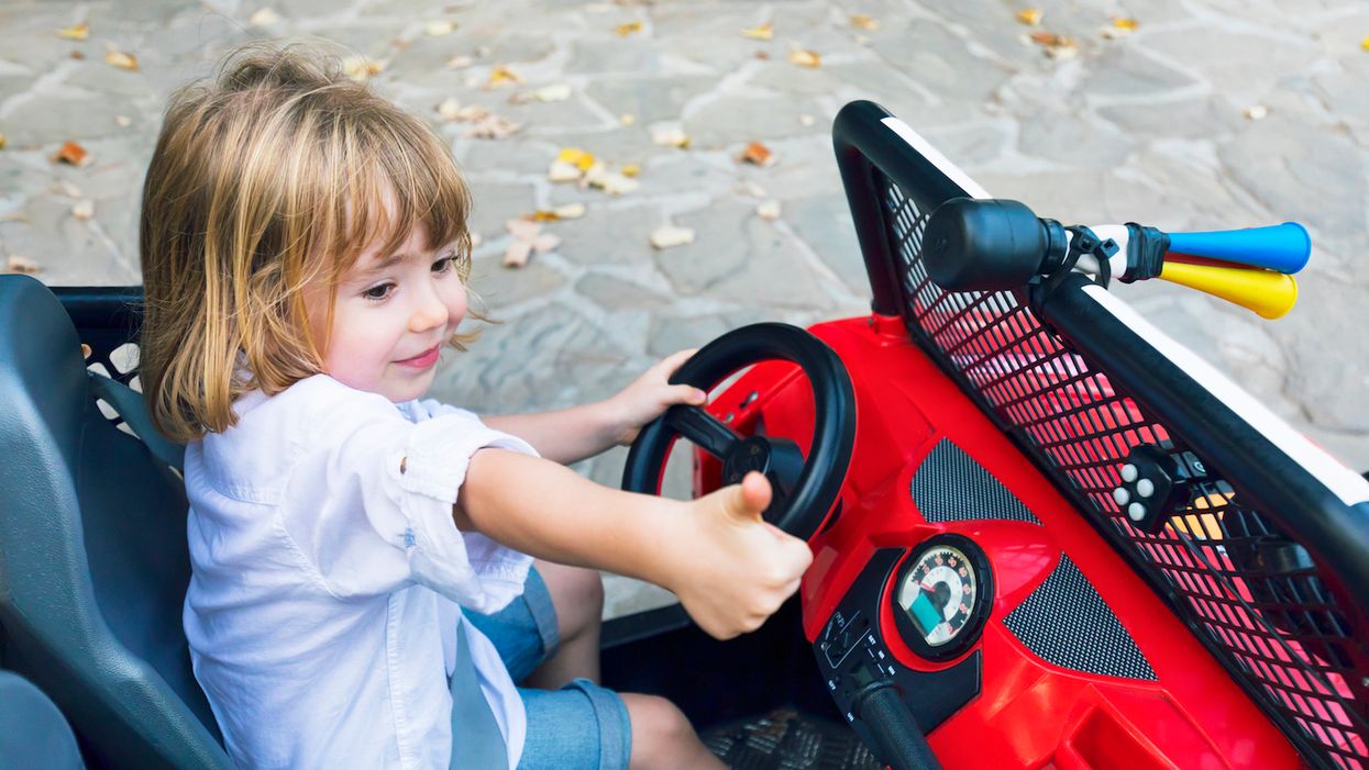 A toddler's dad had a seizure, so the toddler jumped in a toy truck and drove down a busy street for help