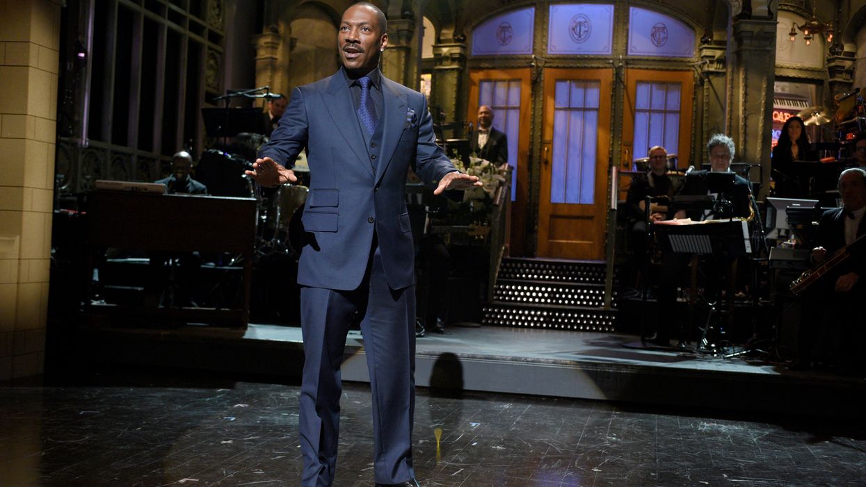 Bill Cosby's publicist blasts Eddie Murphy as a 'Hollywood Slave' after Murphy makes Cosby jokes on 'SNL'