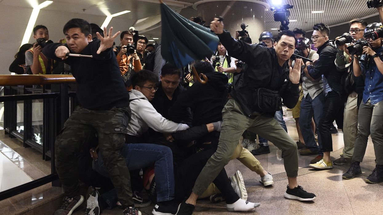 Hong Kong police use tear gas, pepper spray on Christmas Eve protesters