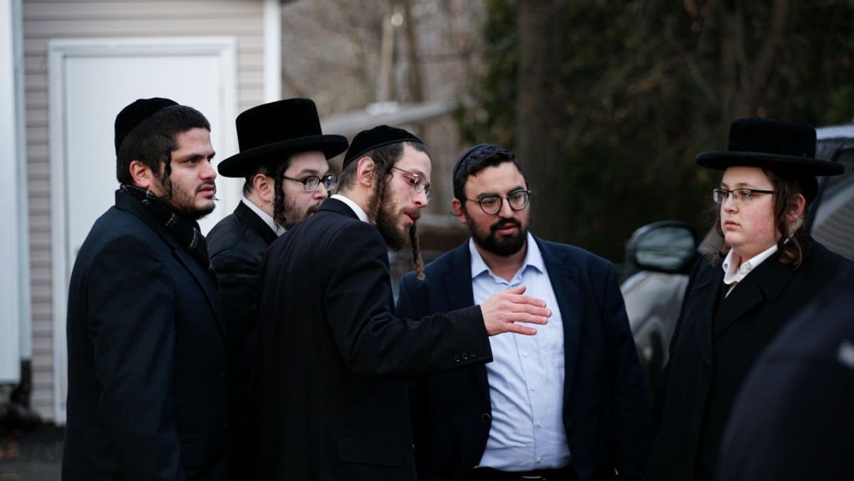 Night of horror: Suspect arrested after stabbing five with a machete in another anti-Semitic attack in NY