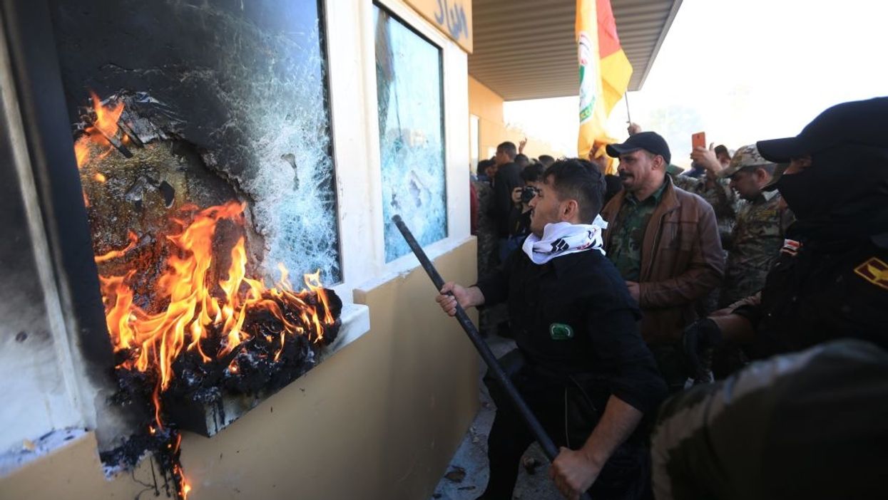 U.S. Embassy in Iraq under siege from violent militia members after airstrikes against Iran-backed insurgent group