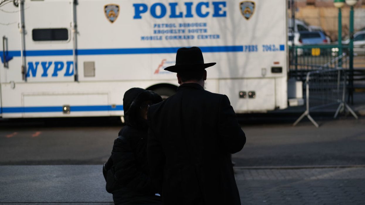 Orthodox Jews seen open carrying firearms in New York after spate of anti-Semitic attacks