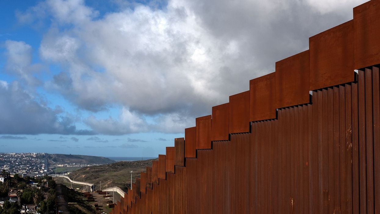 Border Patrol agents rescue three Mexican nationals stuck on top of San Diego border wall