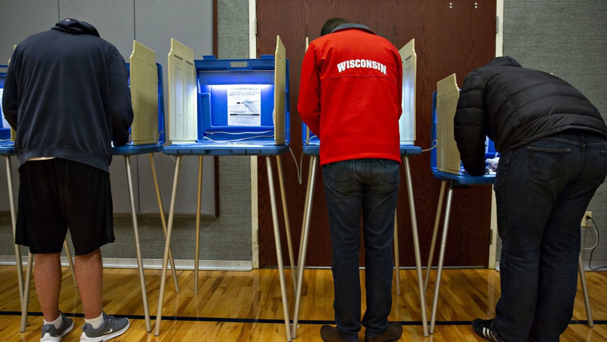 Wisconsin election commissioners refused to remove 209,000 people from voter rolls. Now a judge has found them in contempt of court.