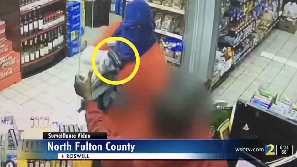 Masked gunman caught on video attacking gas station store clerk. But clerk isn't about to go down without a fight.