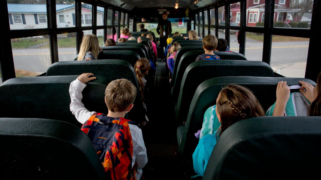 A naked man was arrested in Arkansas after trying to force his way onto a school bus with children inside