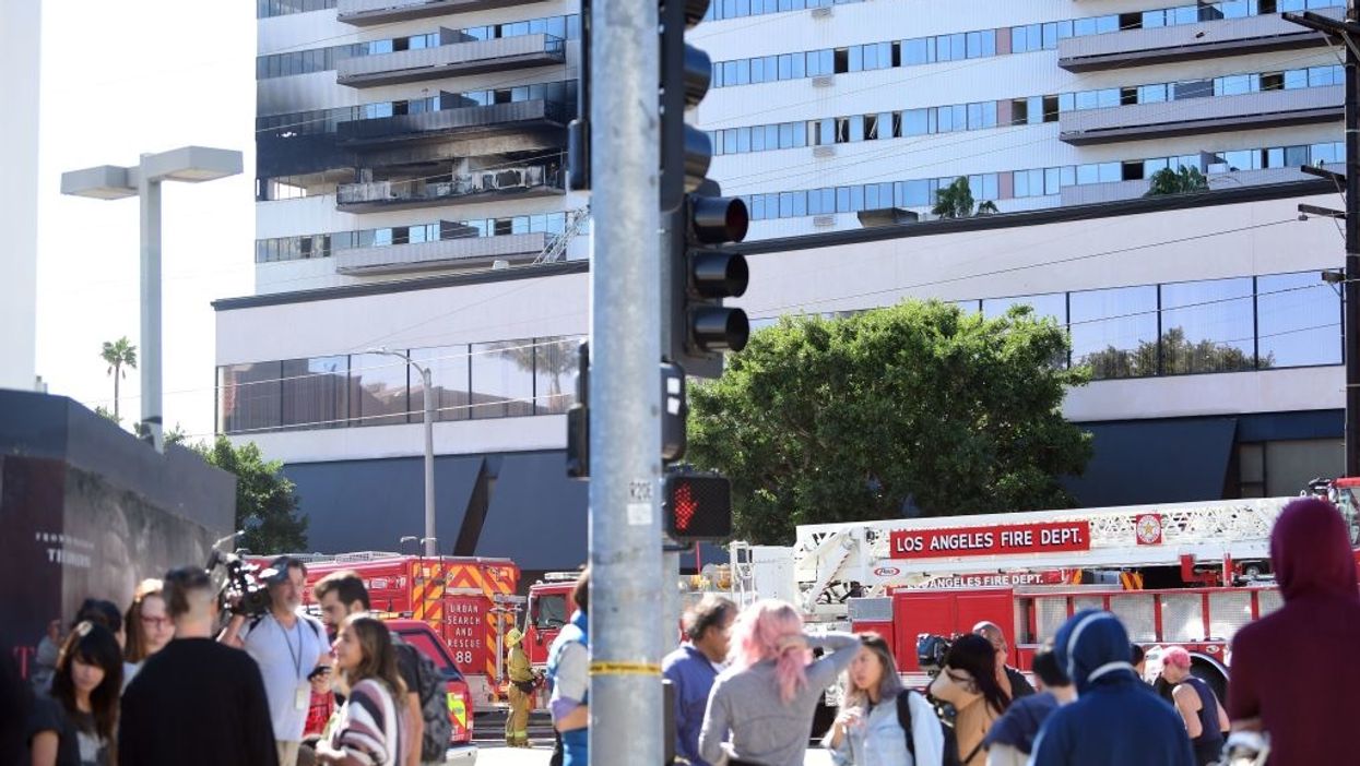 Intense video shows LA firefighters rescuing a person from the sixth floor of a burning building