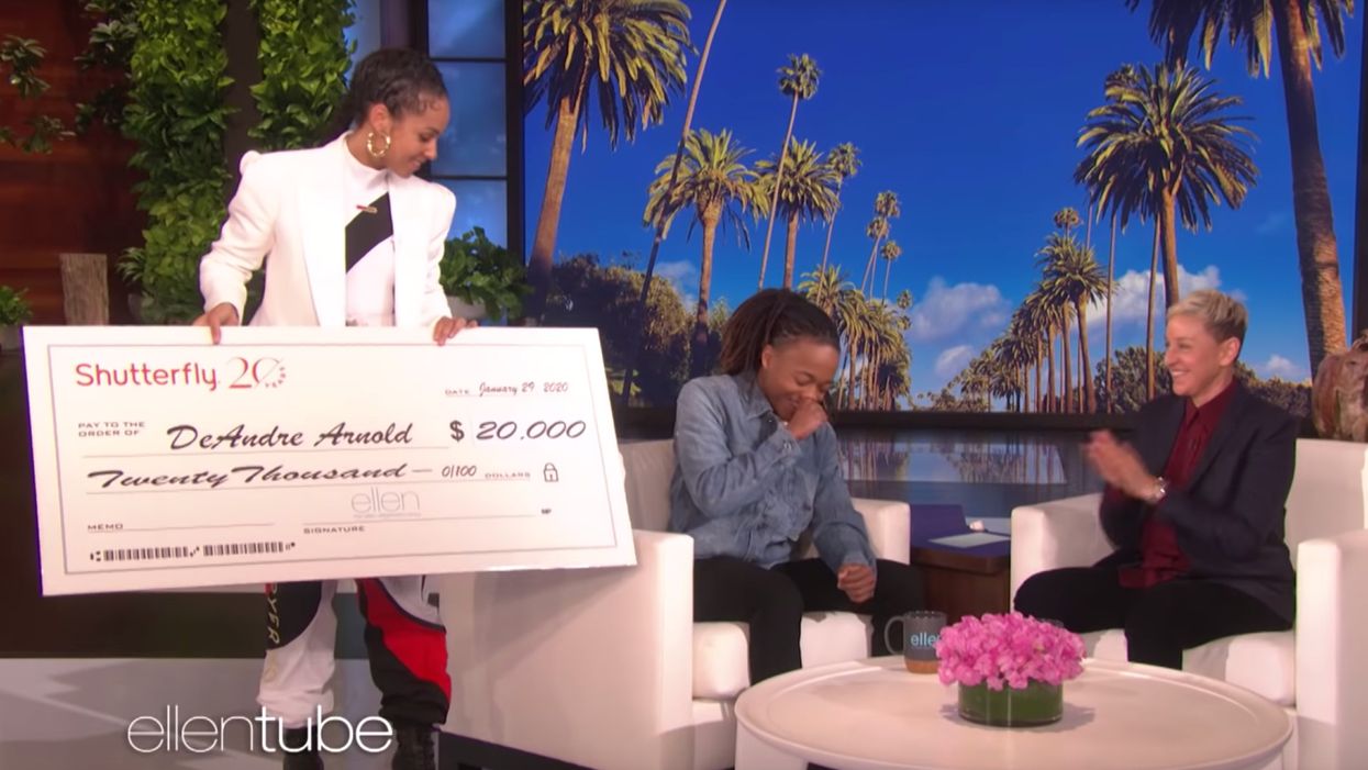 Ellen DeGeneres gifts black teen $20,000 after school tells him to cut dreadlocks before graduation. School says there's more to the story.