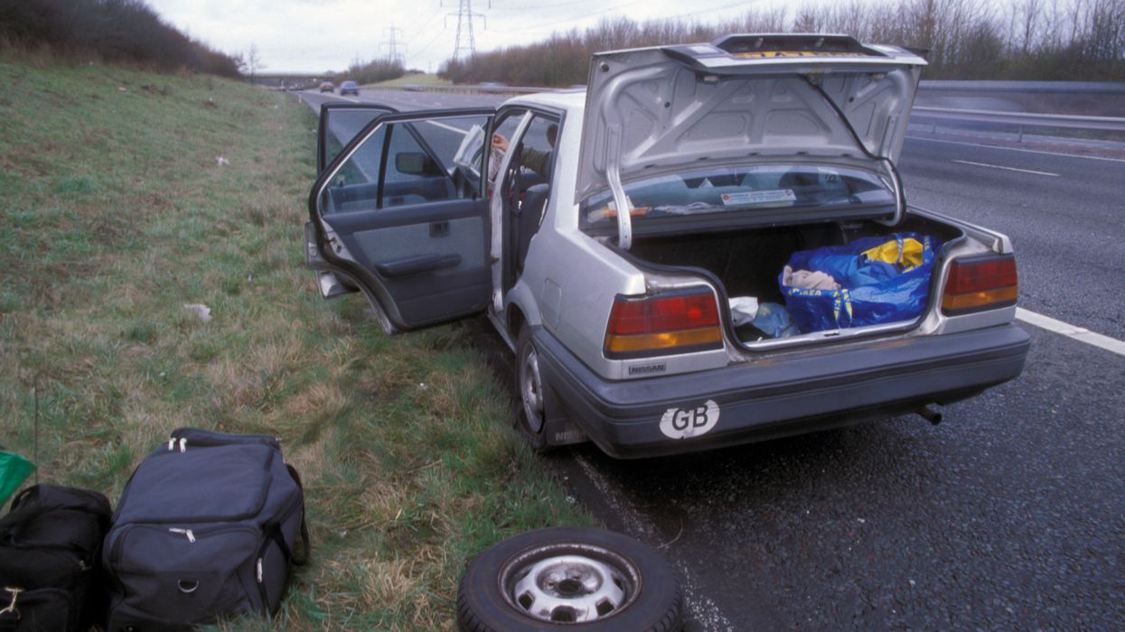 Woman crushes, traps fingers while changing a tire — so she phones 911 using her toes