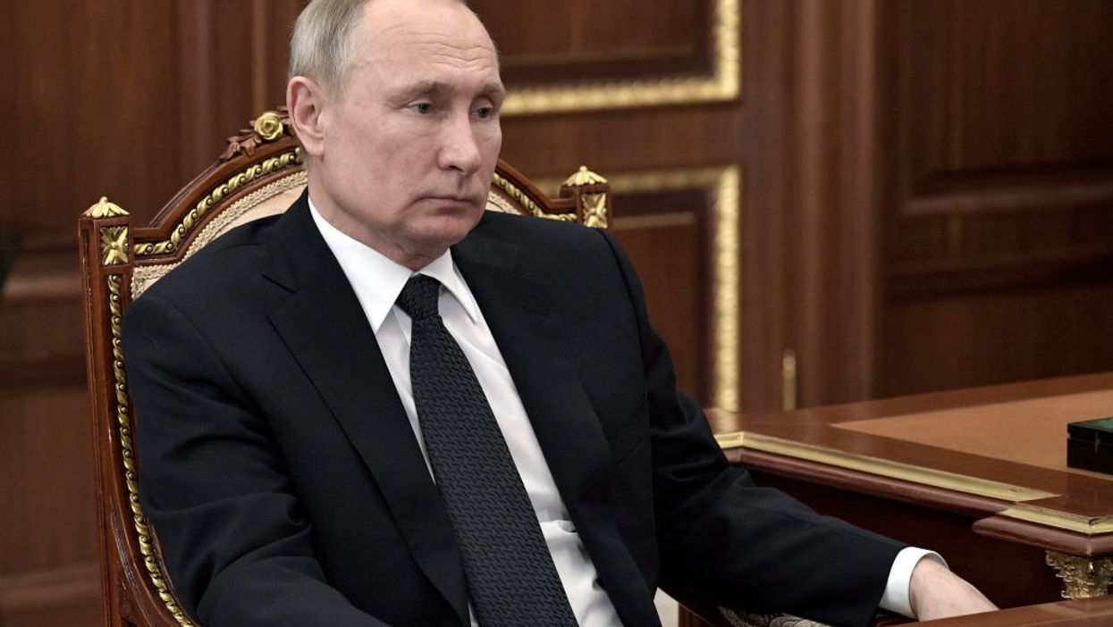 Critic of Vladimir Putin found dead in French hotel room with throat slit and multiple stab wounds