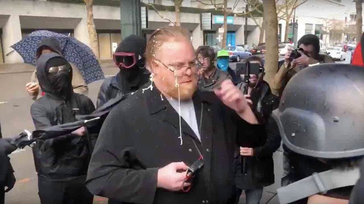 Antifa thugs gang up on journalist, pepper-spray him, jab him with umbrellas, kick and shove him down sidewalk — while cops 'stand by and do nothing'