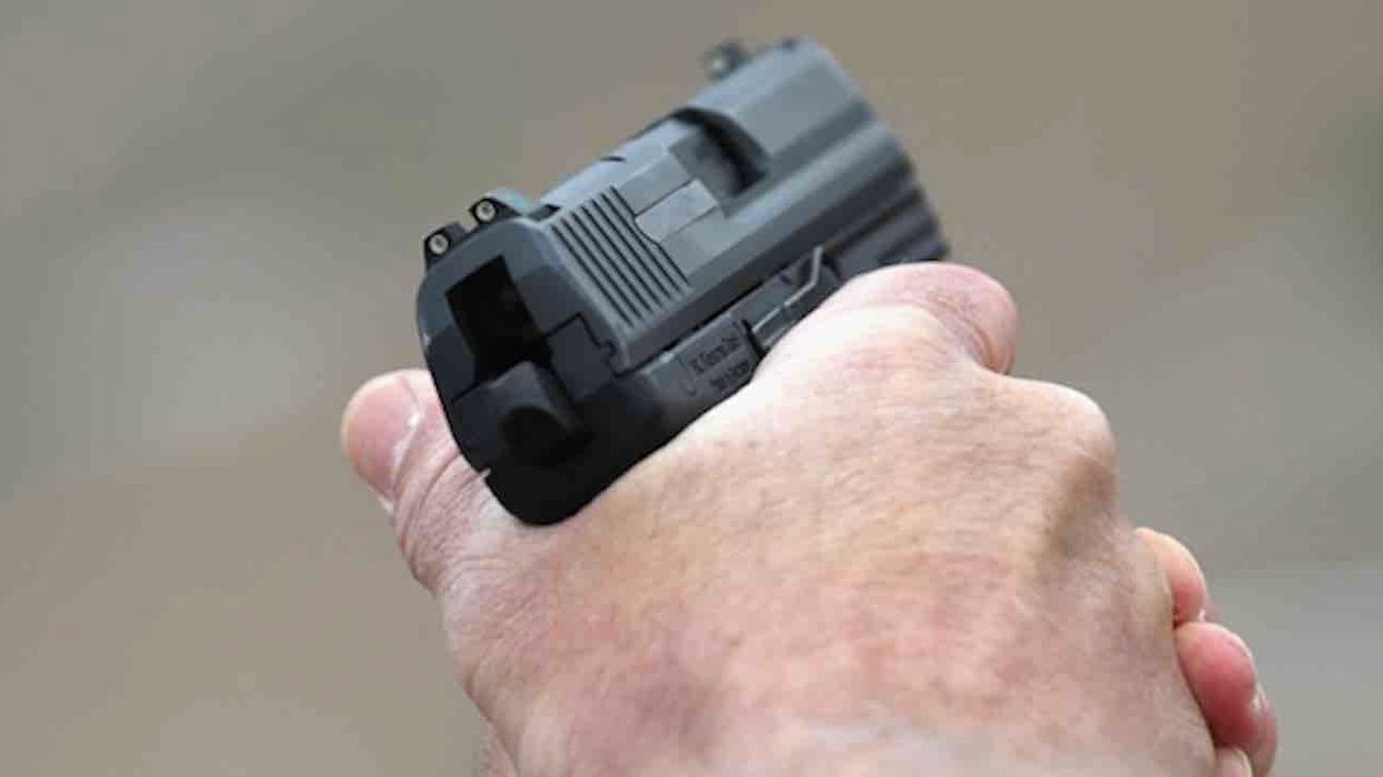 Dad hears daughter scream, runs to her room, tackles intruder — and holds him at gunpoint until police arrive