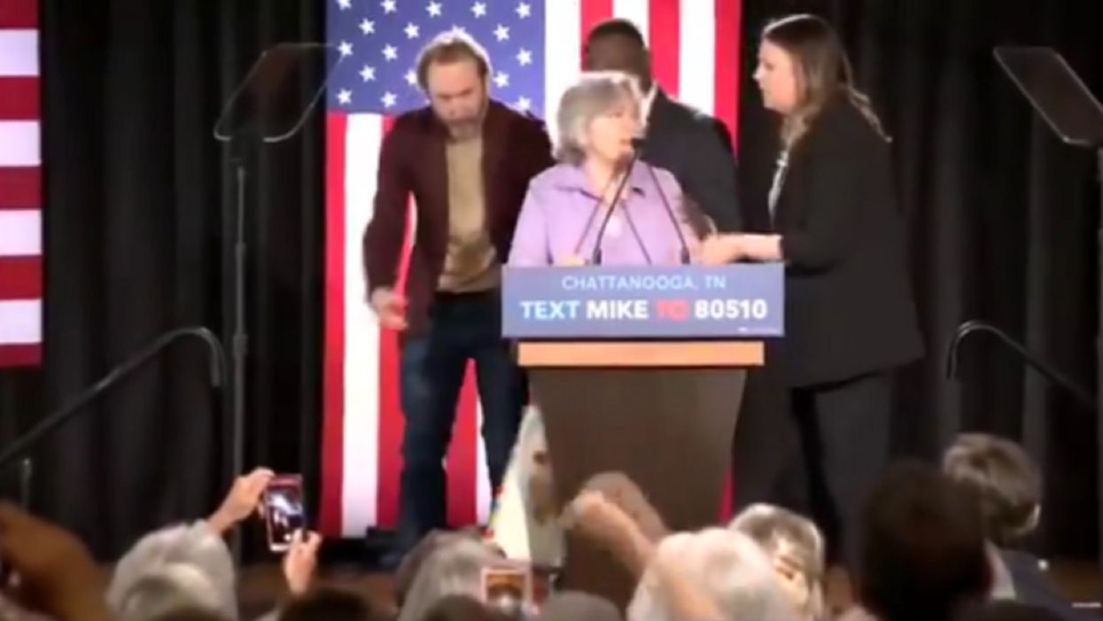 'Bloomberg is trying to buy this election!': Protestor storms stage, takes over podium at Mike Bloomberg rally