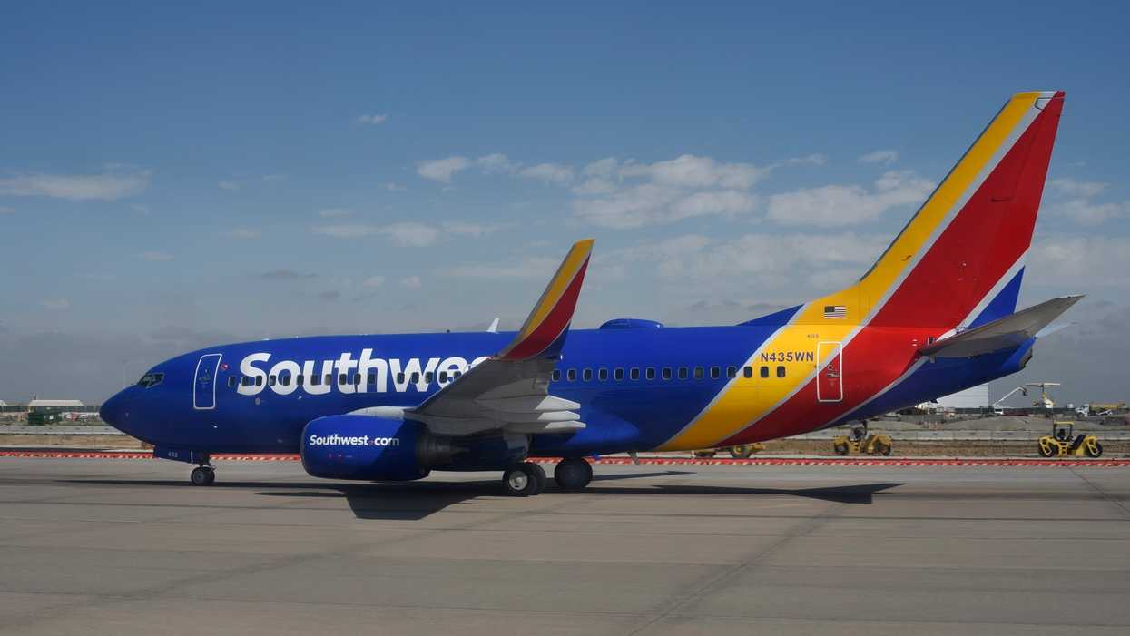 Plane passengers throw impromptu baby shower for couple flying home with adopted 8-day-old daughter