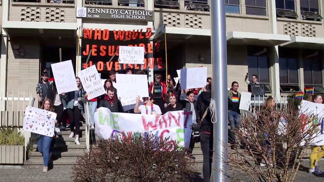 Students walk out of classes to protest Catholic high school allegedly forcing two gay teachers to resign