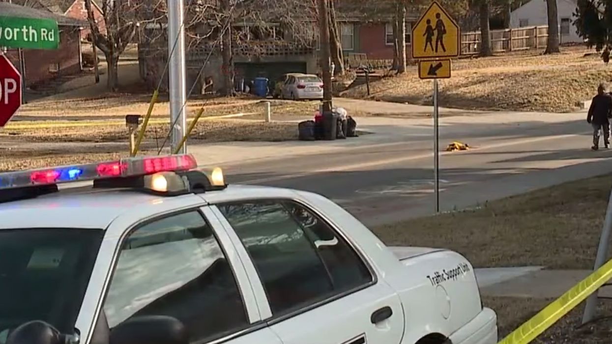 Hero crossing guard struck and killed while saving two grade school kids in Kansas