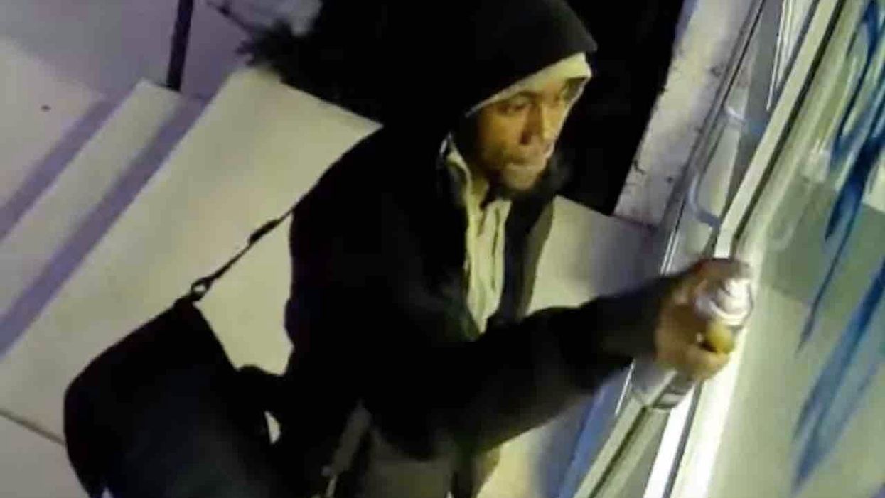 Mural of civil rights leader vandalized with racist graffiti during Black History Month — and cops have suspect on video