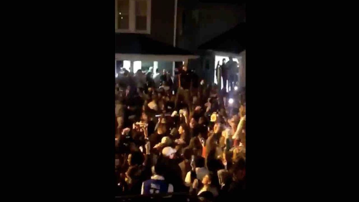 After college cancels classes over coronavirus, 1,000 students gather in street, jump on cars, throw objects at cops — in apparent celebration