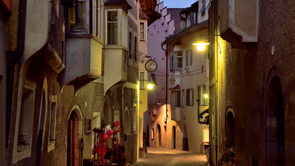 Touching videos show quarantined Italians singing into empty streets amid lockdown