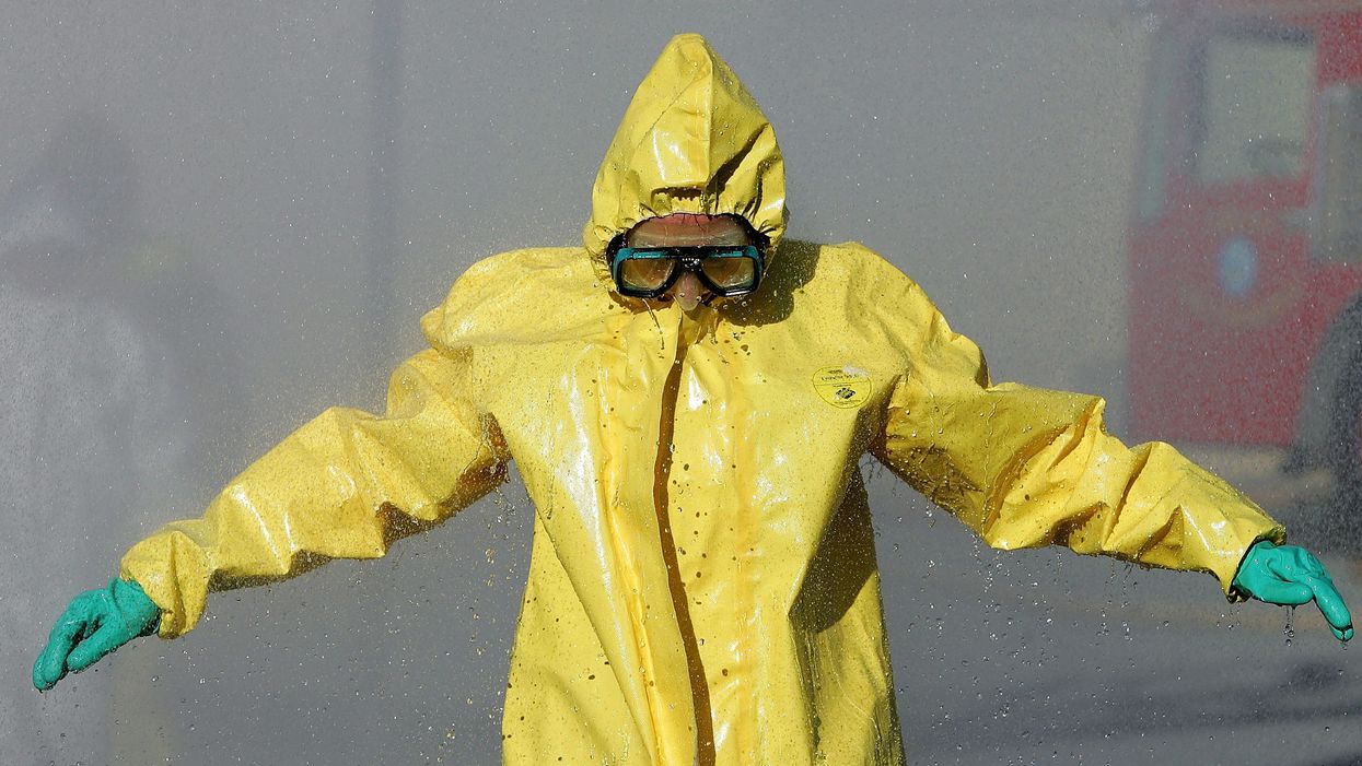 Man in hazmat suit storms Walmart, sprays merchandise with unknown substance