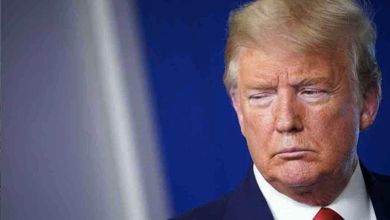 Teacher accused of asking COVID-19 victims to cough on President Trump for money — and the school district is investigating