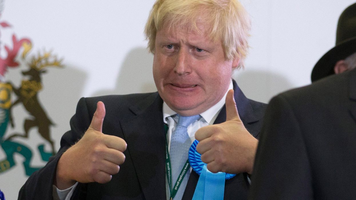 British PM Boris Johnson condition improves, report says he's 'sitting up in bed' despite being in ICU