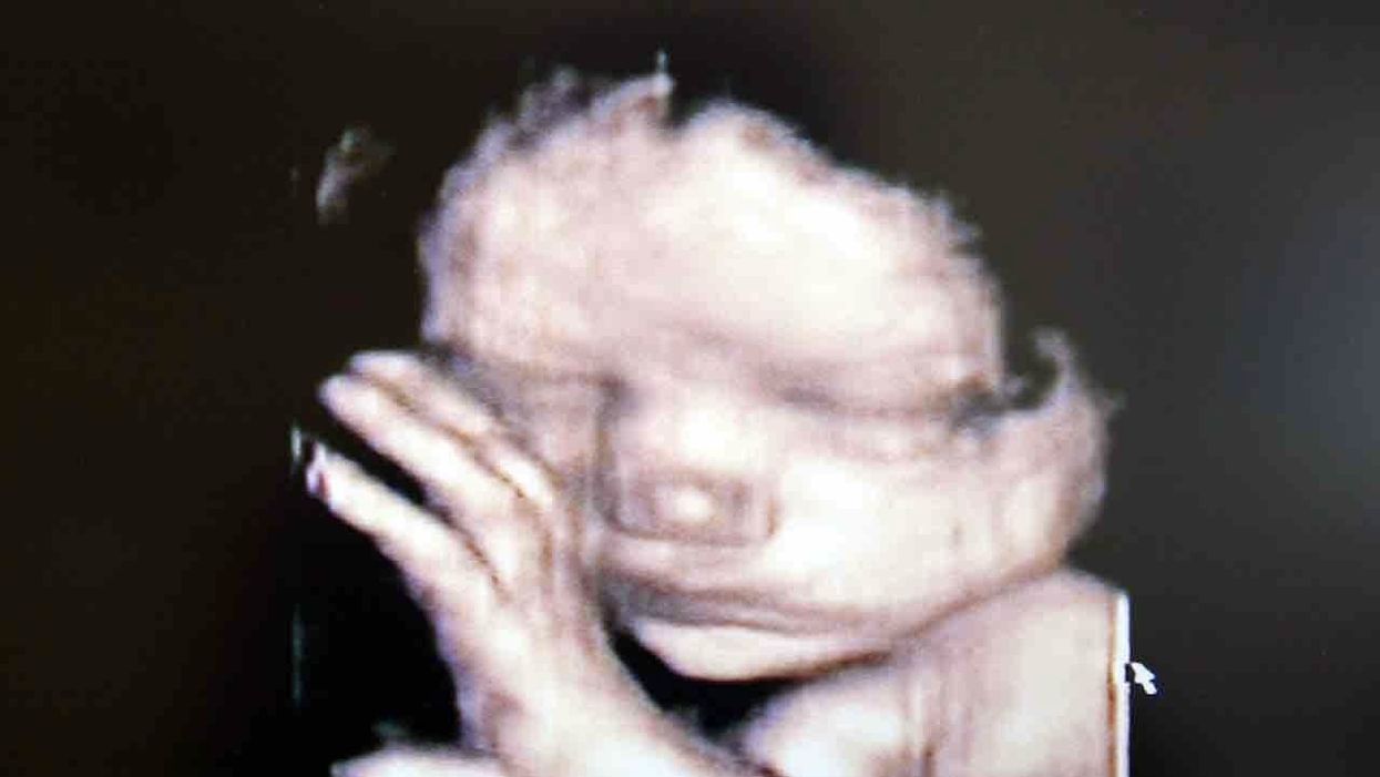Abortionist gets jail for drowning baby in bucket of water after infant 'burst out crying' during botched abortion in South Korea