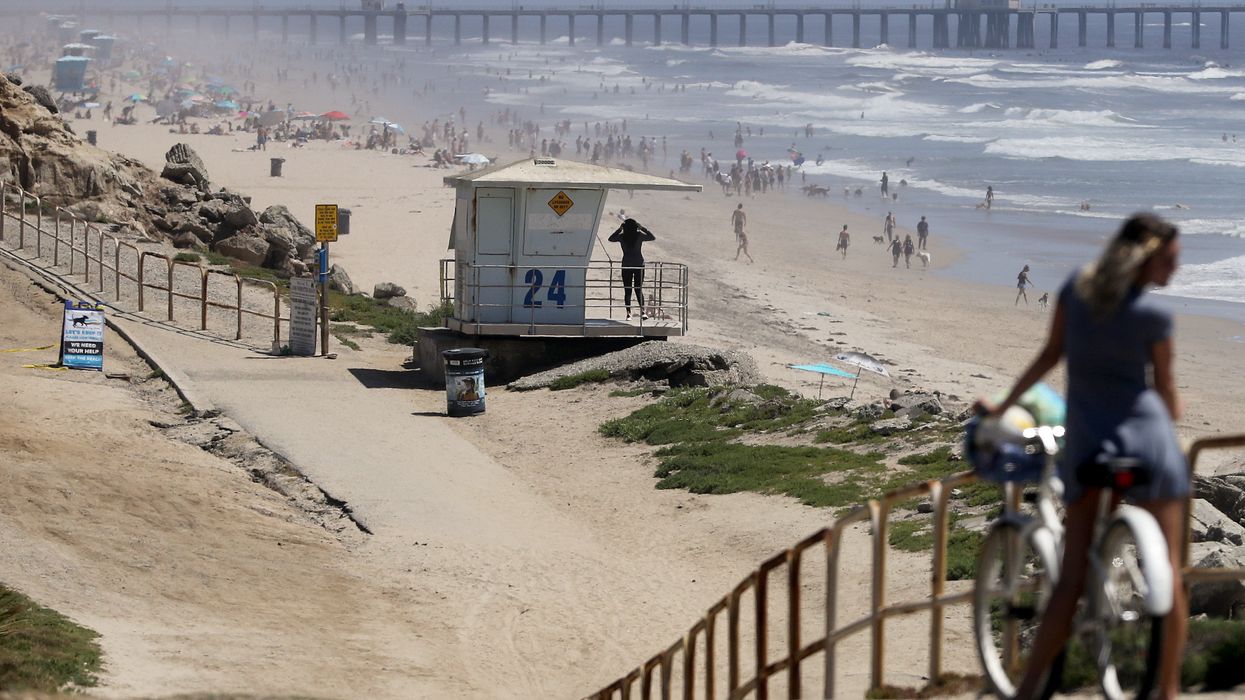 Tens of thousands swarm California beaches despite governor's stay-at-home orders