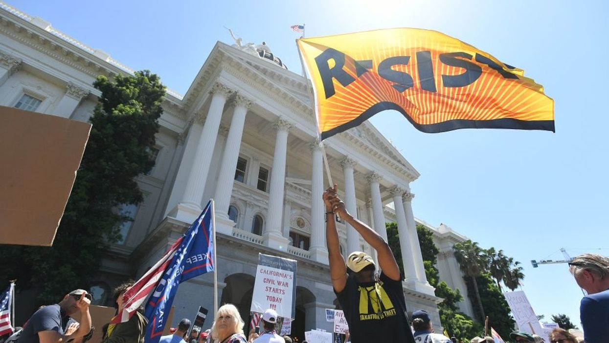 Nearly three dozen arrested at California's state capitol during stay-at-home protest