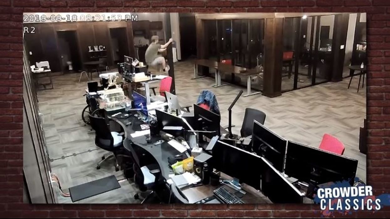 Surveillance camera catches Steven Crowder's editor climbing a pole after hours