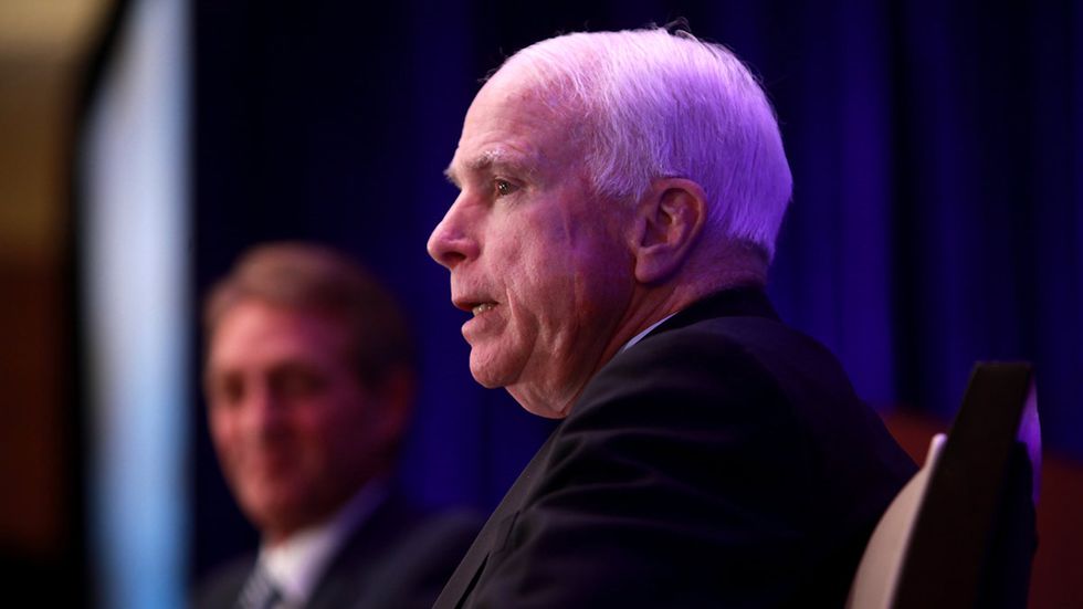 John McCain slips in provision to draft women in defense bill