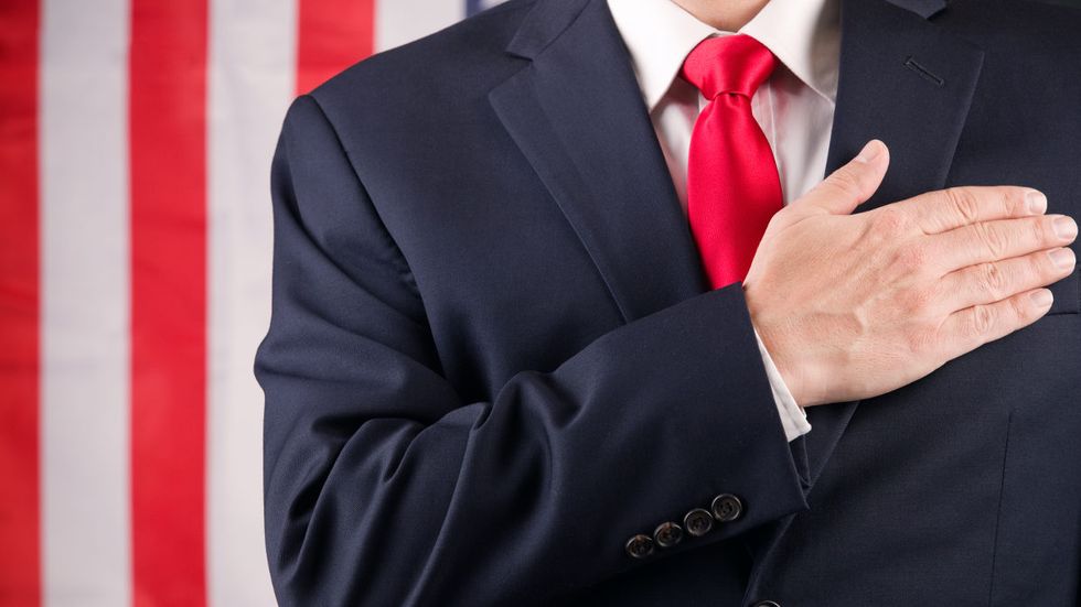 Ann Arbor city council members kneel for Pledge of Allegiance